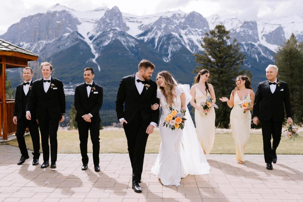 Bridal party with bouquets at a Silvertip Resort wedding in Canmore, Alberta.